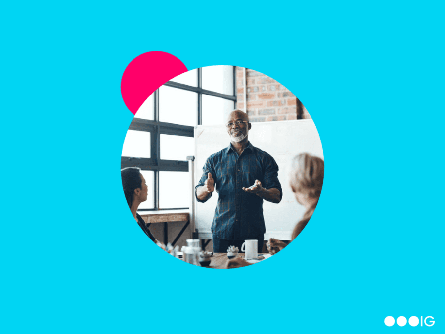 Image of a trainer leading a training experience in an office How to Create a Professional Development Plan for Your Team